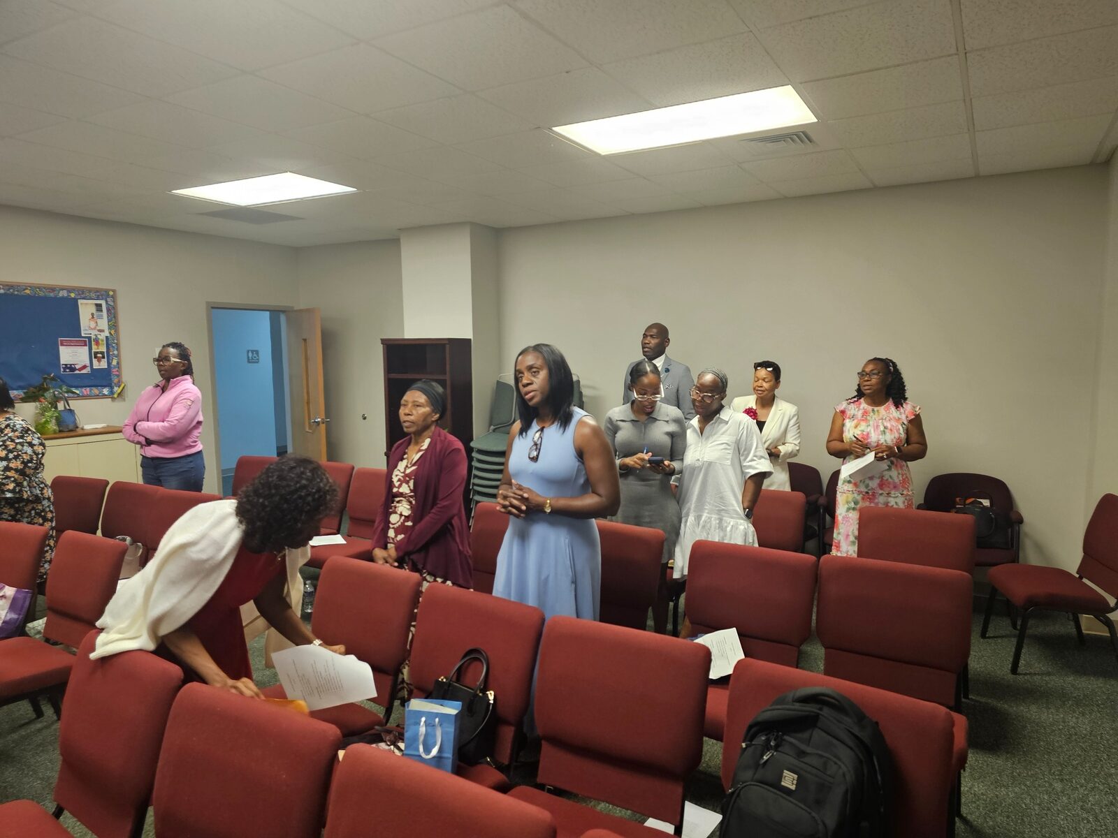 Church members gathering after worship