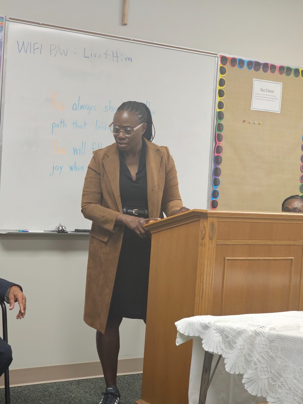 A church speaker sharing a message from the lectern