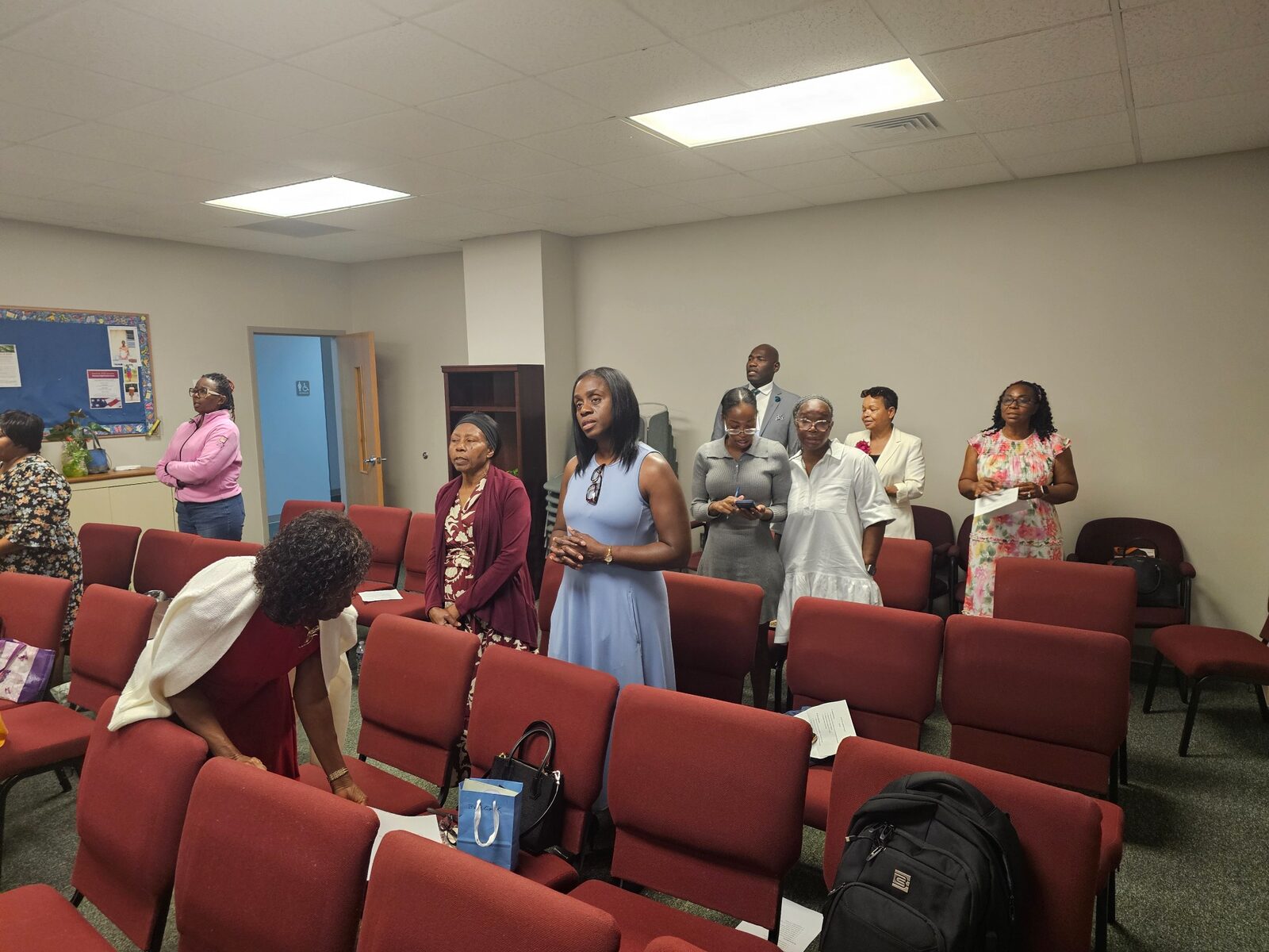 Hearts of Love Ministry members standing together during worship